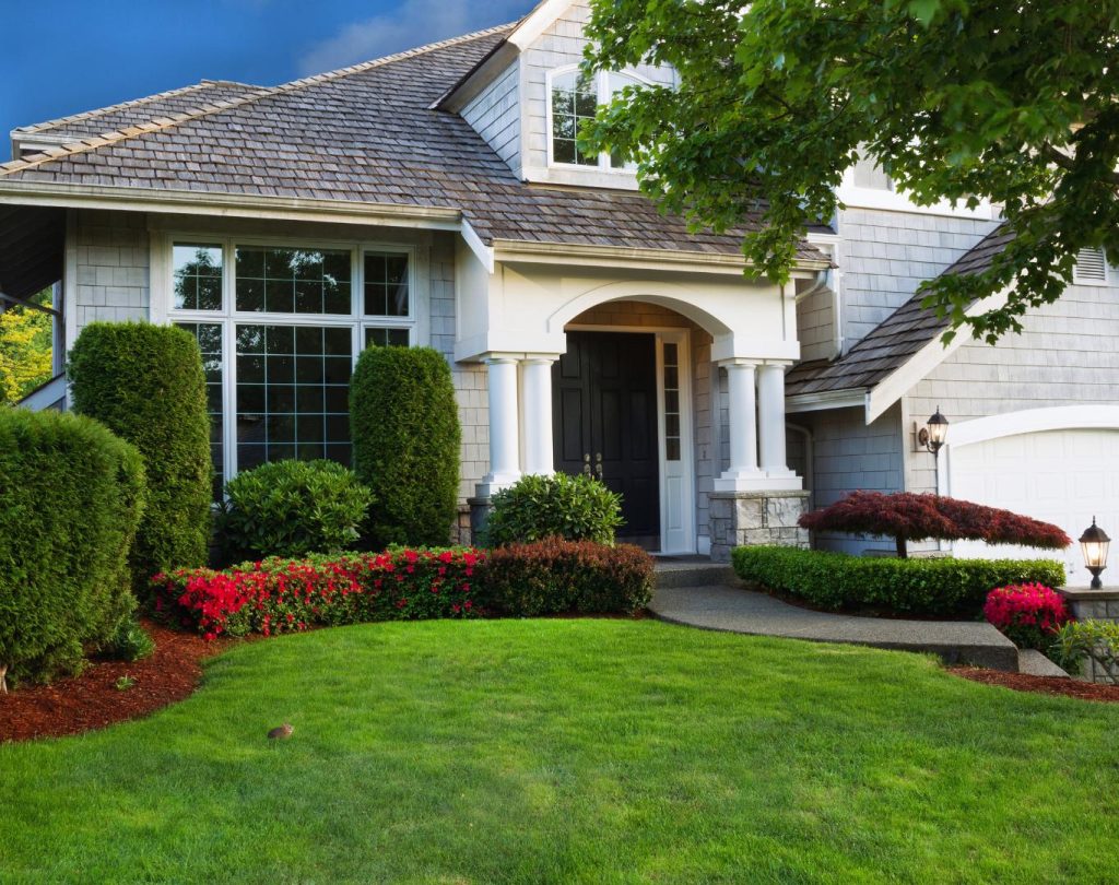 Landscaping near me in Silver Lake, KS featuring lawn renovation and edging